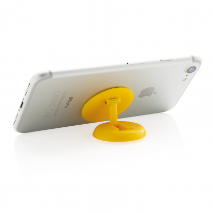 Универсальный держатель для телефона Stick 'n Hold, жёлтый, пример использования